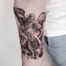 Mikael dräper lucifer tatuering, Michael slay lucifer tattoo.