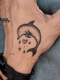 Delfin tatuering, Dolphin tattoo.