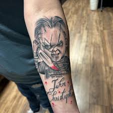 Chucky tatuering, Chucky tattoo.