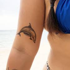 Delfin tatuering, Dolphin tattoo.