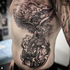 Mikael dräper lucifer tatuering, Michael slay lucifer tattoo.